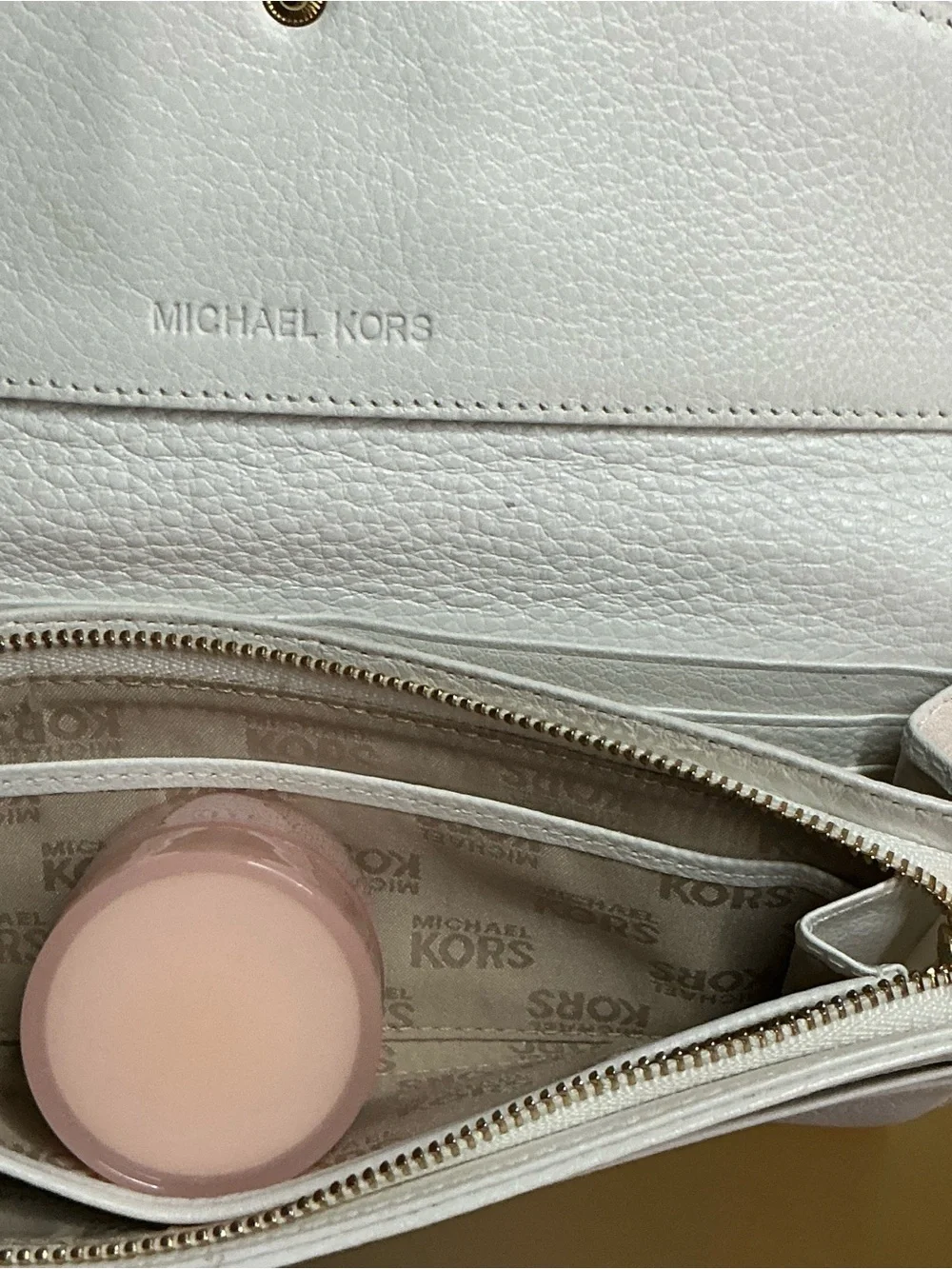 Michael Kors previously owned